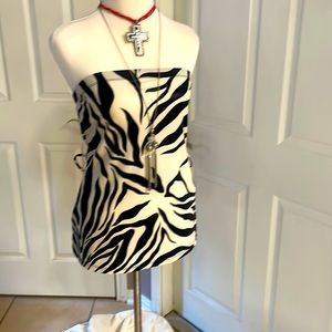 Moa Moa size large junior zebra print tank. This tank is reflective.